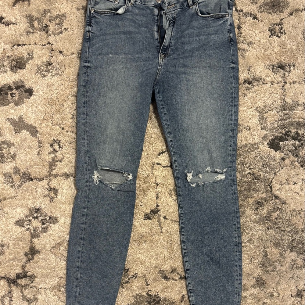 Women's Distressed Blue Jeans
